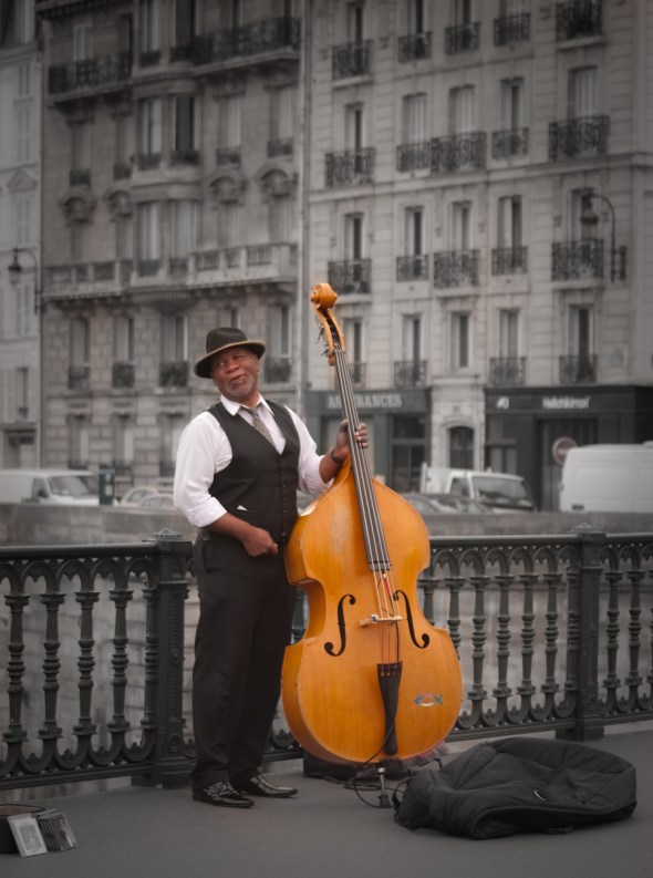 Jazz Bassist by Notre Dame in Paris
