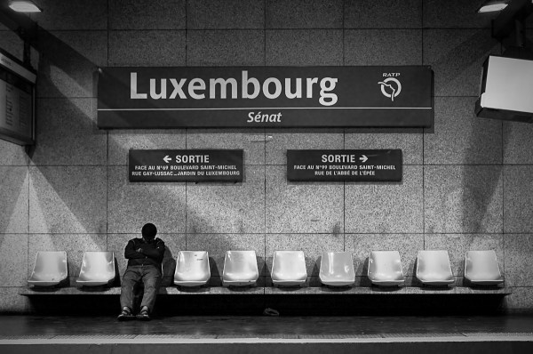 Street photo in Paris metro - fast asleep